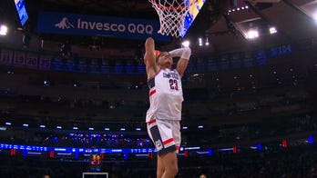 Jayden Ross gets steal and finishes dunk on fast break, extending UConn's lead over Xavier