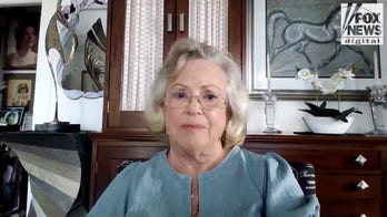 An 83-year-old widow was fined $590,000 for a website glitch. Now she’s suing.