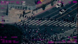 DHS releases drone footage of rioters attacking vehicles in Los Angeles