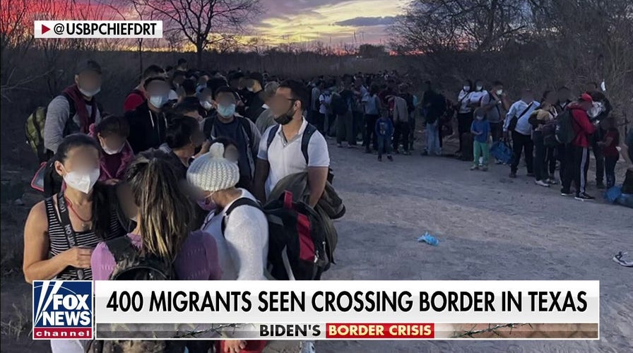  Video shows 400 migrants illegally crossing into Texas at once