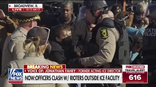 Officers clash with rioters outside Chicago-area ICE facility
