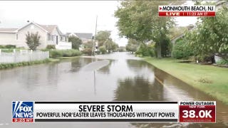 Nor’easter floods Jersey Shore as residents paddleboard down streets
