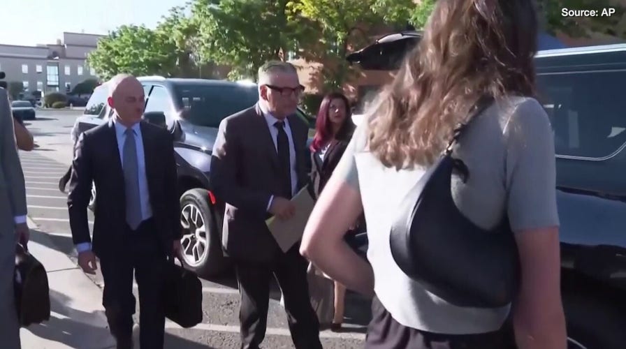 Alec Baldwin and his wife, Hilaria Baldwin, arrive for the first day of jury selection in 'Rust' shooting trial