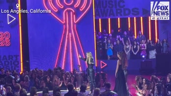 Miley Cyrus accepting the Innovator Award at the iHeartRadio Music Awards