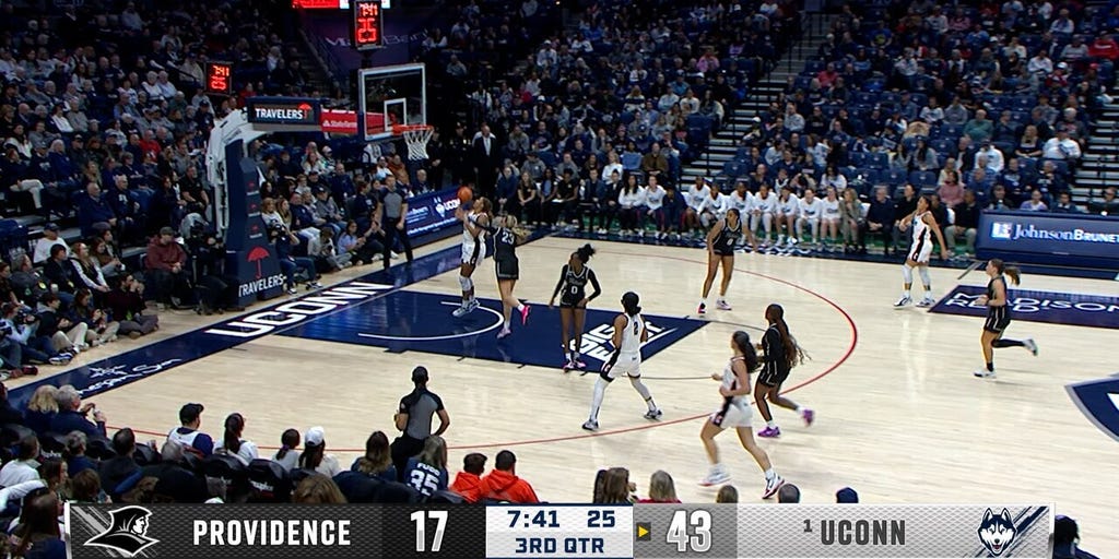 UConn's Sarah Strong forces the turnover and finishes the fast break vs. Providence