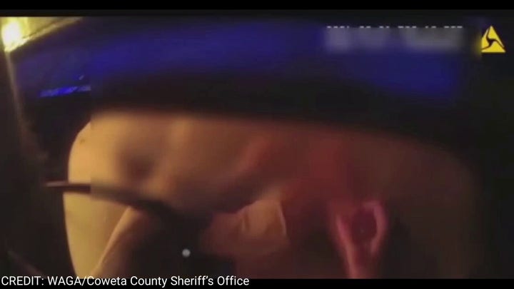 Georgia authorities rescue motorist from burning SUV in heart-stopping footage