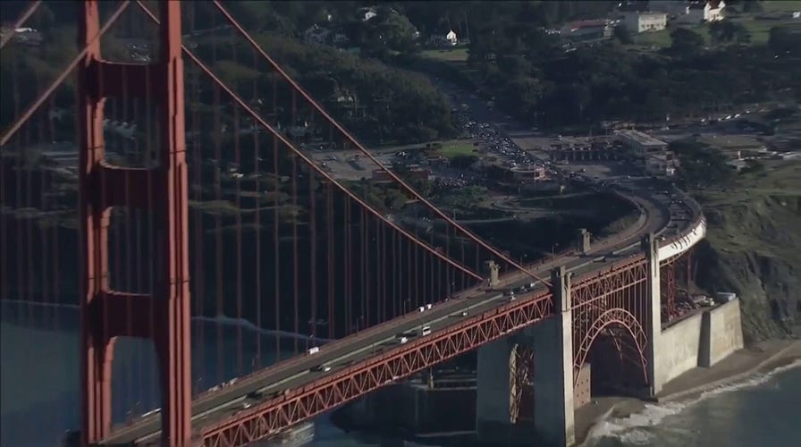 Anti-vaccine mandate protesters gather at the Golden Gate Bridge on Thursday