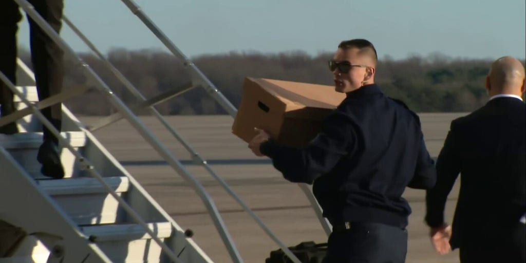 Trump staffers load boxes onto Air Force One containing materials taken from Mar-a-Lago
