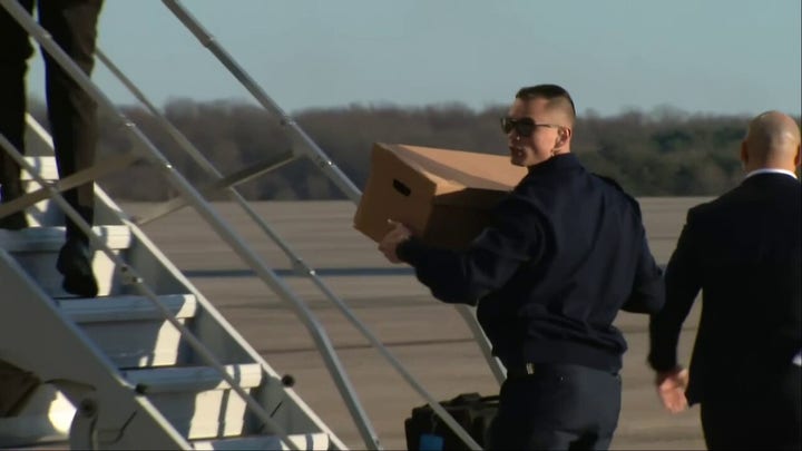 Trump staffers load boxes onto Air Force One containing materials seized from Mar-a-Lago