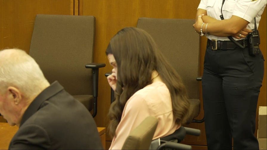 Lindsay Clancy clutches tissues as jurors hear about her three children