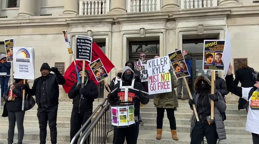 Protesters chant outside the Kenosha County Courthouse