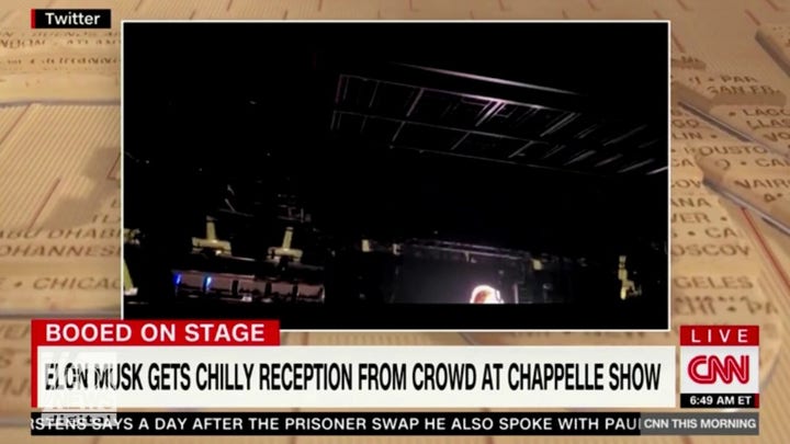 Audience boos Elon Musk after Dave Chappelle brings him on stage