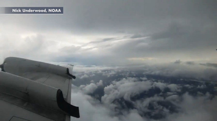 Time-lapse footage shows plane fly through Hurricane Laura