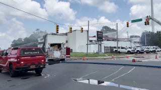 Debris litters streets after fiery North Carolina explosion