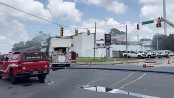 Debris litters streets after fiery North Carolina explosion