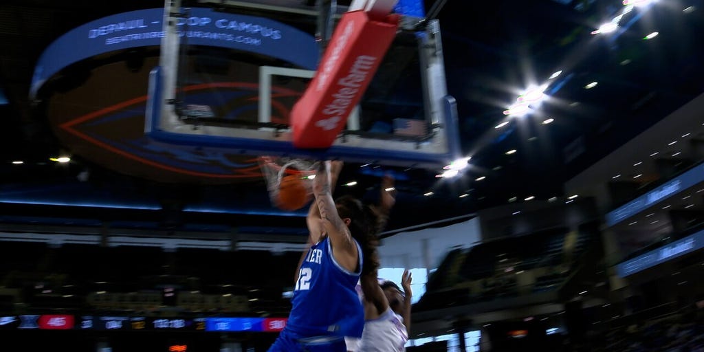 Xavier's Tre Carroll drives baseline for STRONG poster finish vs. DePaul