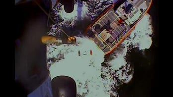 US Coast Guard rescues stranded boaters as they fend off sharks