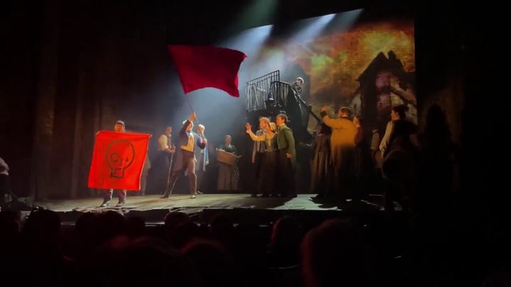 Climate protesters shut down Les Misérables performance in London