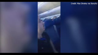 Passenger films cabin shock after flight takes nosedive - Fox Business Video