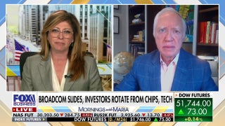 Dow surges to new record as investors flee AI stocks after Broadcom selloff