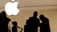 Apple lowers revenue guidance as the media eyes Trump-China trade dispute
