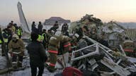 Kazakhstan plane crash leaves at least 12 dead