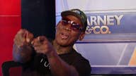 Dennis Rodman tosses to Neil Cavuto
