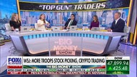 US servicemembers turning to stock picking, crypto trading, report shows