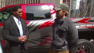 Herschel Walker presents veteran with custom truck