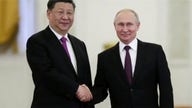China quietly cheering on Russia behind the scenes: Sources