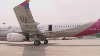 Asiana Airlines passenger opens plane door during South Korea flight - Fox Business Video