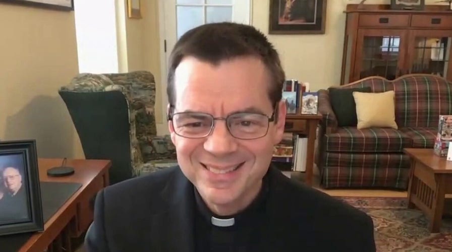 Priest's card collection raises $50G for children, school scholarships