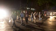 Looting and violence spreads across Venezuela amid nationwide blackout
