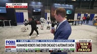 Humanoid robots showcase skills at industry event, highlighting AI's growing role