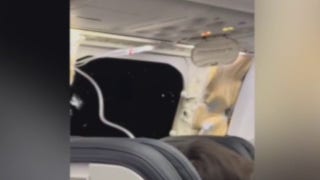 Alaska Airlines passenger captures emergency landing after section of plane blows off mid-flight - Fox Business Video