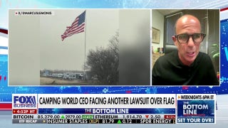 CEO remains defiant in lawsuit against him flying his 'colossal' American flag