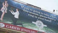 Jeweler accused of racism for 'take a knee' billboard