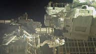 NASA astronauts conduct spacewalk outside of ISS 