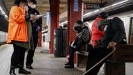 Homeless people sleep in New York City subway amid coronavirus
