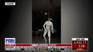 Clone unveils lifelike robot to do household chores