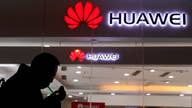 Trump to sign executive order banning US companies from using Huawei equipment 
