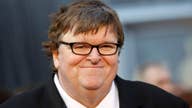 Michael Moore lashes out at President Trump on Twitter