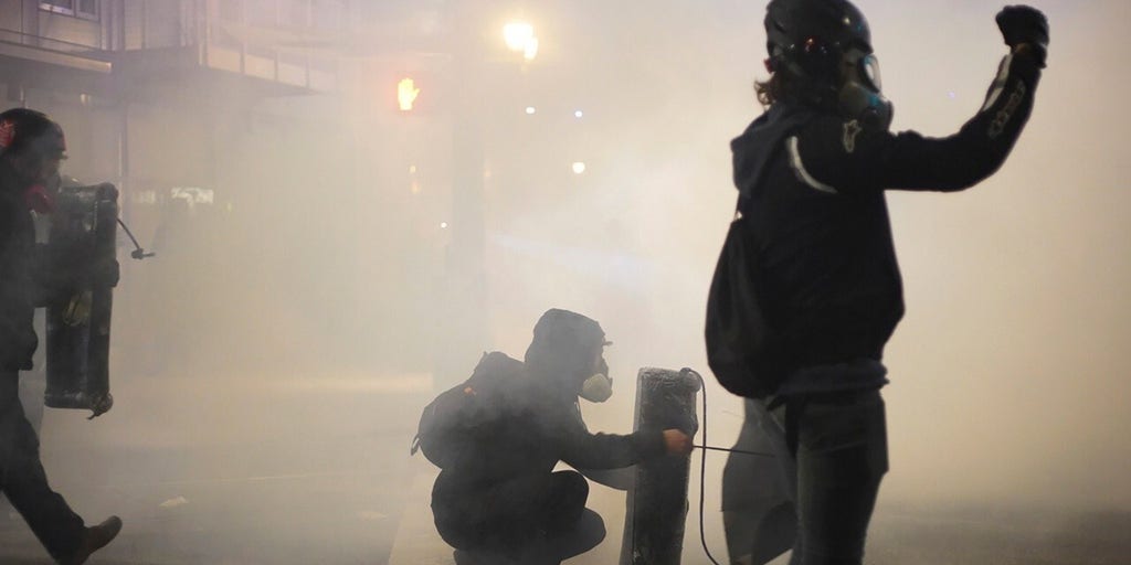 Portland rioters attack local ICE building | Fox News Video