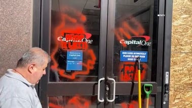 Capitol One bank branch vandalized with anti-Israel messages, windows shattered