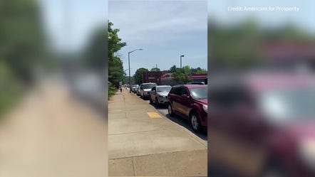 Cars line up for gas roll back event in Pittsburgh