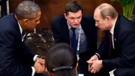 Obama talks to Putin in Paris