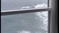 Cruise ship battered by waves as it sails through Drake Passage