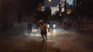 Tear gas rains down on angry protesters in Beirut  