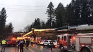 Amtrak train derails on highway in Washington state