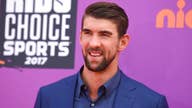 Michael Phelps faces off with a Great White Shark